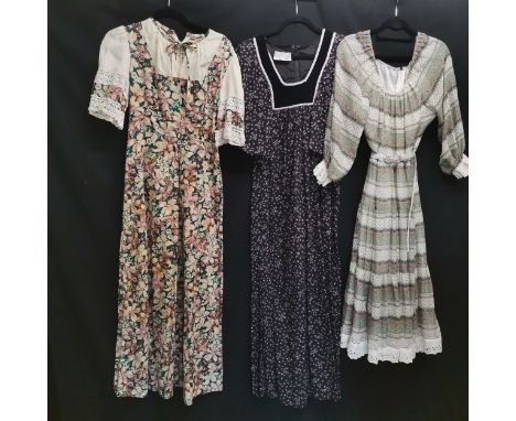 3 1960s Dresses, green multi floral with cream trim 84cm bust t/w black floral print bell sleeves by Earlybird London t/w str