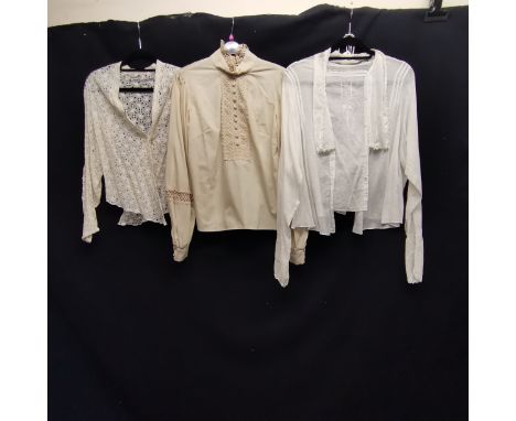 Three cotton blouses, one broiderie anglais 80cm bust, edwardian style lace trimmed 88cm bust t/w an edwardian lawn blouse 10