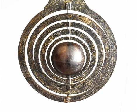 This wonderful 19th century astrolabe has 5 rings around a globe. On the outermost ring are the astrological signs, the secon