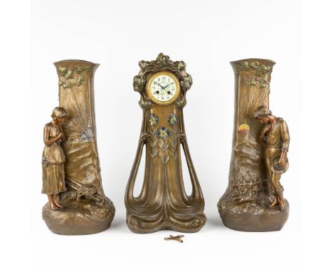 Aristide DE RANIERI (1865-c.1929) A three-piece mantle garniture clock and side pieces, made of spelter in Art Nouveau style.