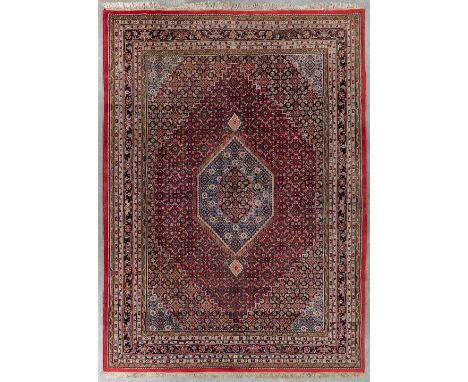An Oriental hand-made carpet, Bidjar. Dimensions: (L: 340 x W: 247 cm)