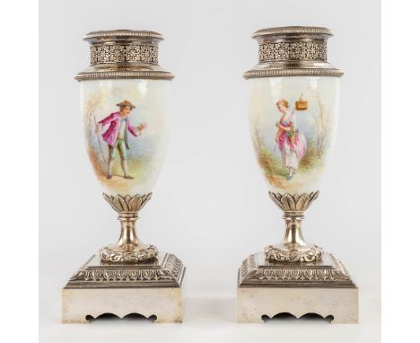 A pair of porcelain cassolettes mounted with silver-plated bronze and decorated with romantic scnes. 20th century. Condition: