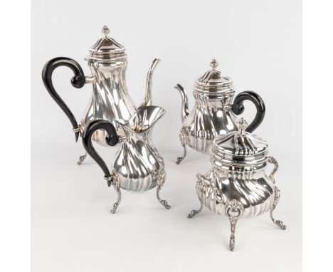 A coffee and tea service, made of Silver. Marked 800. Gross weight: 3,126kgDimensions: (H: 31 cm)
