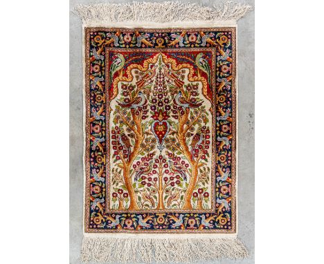 A figurative Oriental carpet with 'Tree of Life' decor, Isphahan. (80 x 58 cm)Dimensions: (L: 80 x W: 58 cm)