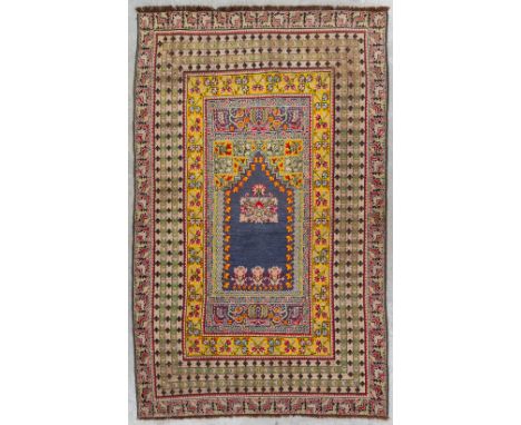 An Oriental hand-made carpet, Oushak, Turkey. Dimensions: (L: 230 x W: 147 cm)