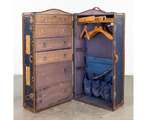 An antique Steamer Trunk 'Innovation', with clothes hangers and drawers. Circa 1920-1930. Dimensions: (L: 50 x W: 59 x H: 115
