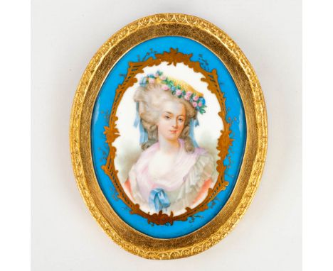 Svres, a porcelain plaque with an image of Queen Marie Antoinette. Mounted in a gilt bronze frame, Circa 1900. Dimensions: (W