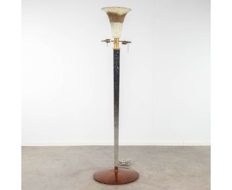 A large floor lamp finished with glass sides standing on a wood base. Circa 1930. Dimensions: (H: 192 cm)