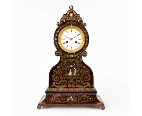 A neoclassical table clock made of wood inlaid with copper, mother of pearl and bone. France, 19th century. Dimensions: (L: 1