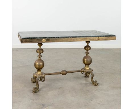 A mid-century coffee table made of bronze with a green marble top, decorated with mythological figurines. Circa 1960. Dimensi