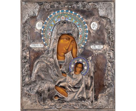 An Eastern-European icon, Madonna with child. Silver-plated metal and enamel. Dimensions: (W: 27 x H: 31 cm)
