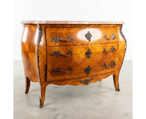 A commode with marble top and mounted with bronze in Louis XV style. The second half of the 20th century. Dimensions: (L: 53 