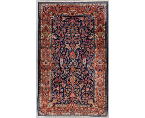 An oriental hand-made carpet, Kashan. Dimensions: (L: 205 x W: 128 cm)