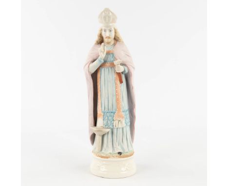 A bisque porcelain figurine of Saint EligiusCondition: Small chip to the mitre.&nbsp;Dimensions: (H: 32 x D: 9,5 cm)