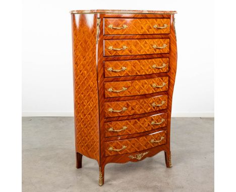 A 7-drawer cabinet finished with marquetry inlay and mounted with bronze and a marble top. Circa 1970. Dimensions: (L: 83 x W