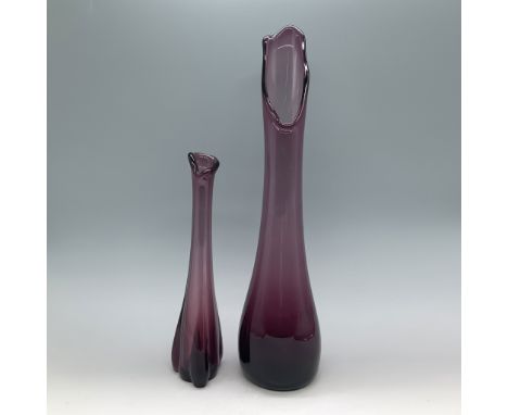 This exquisite 2-piece set features handblown glass vases in a captivating dark amethyst color. The larger vase has a gracefu