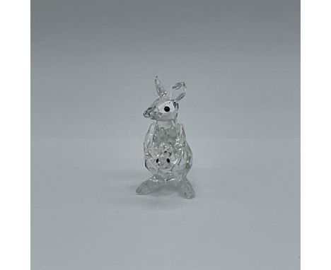 This delightful Swarovski crystal figurine, featuring a mother kangaroo with her baby joey, was designed by Gabriele Stamey a