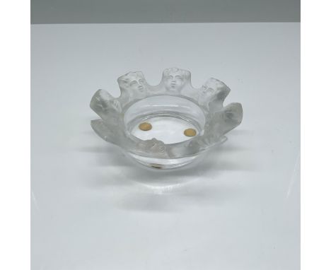 This exquisite Lalique crystal trinket dish, known as the St. Nicholas design, features a ring of eight frosted cherub faces 