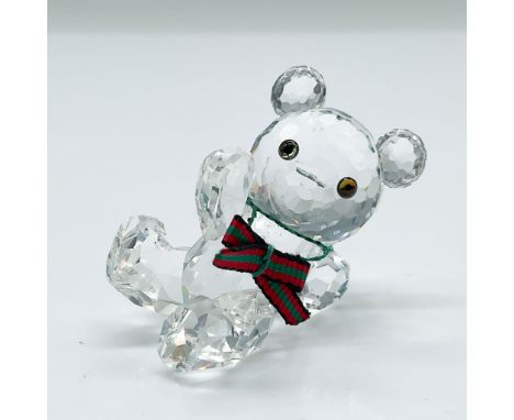 This is a delightful Swarovski Crystal Kris Bear figurine, showcasing exquisite craftsmanship and precision-cut crystal. Desi