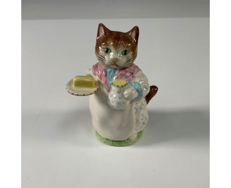A charming Beswick Beatrix Potter figurine featuring Ribby, the kind-hearted cat from Beatrix Potter's "The Tale of the Pie a