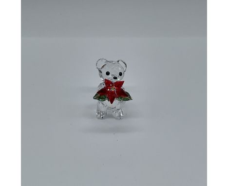 This delightful Swarovski Crystal Kris Bear 1139967, introduced and retired in 2012, is an enchanting addition to any festive