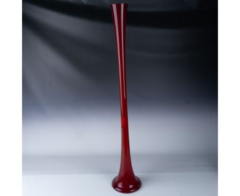 This impressive red art glass vase stands at an eye-catching 40.5 inches tall, offering a bold, contemporary design. The piec