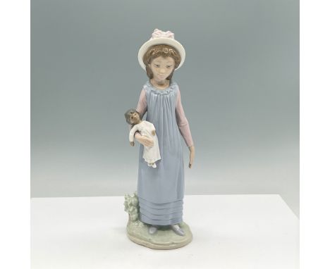 This is the Lladro figurine titled Belinda with Her Doll, model number 01005045, sculpted by Vicente Martinez. First issued i