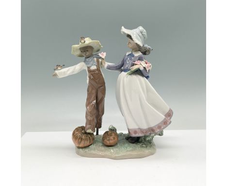 Presenting the Lladro Scarecrow and the Lady figurine, model 01005385. Sculpted by Regino Torrijos, this charming piece was i