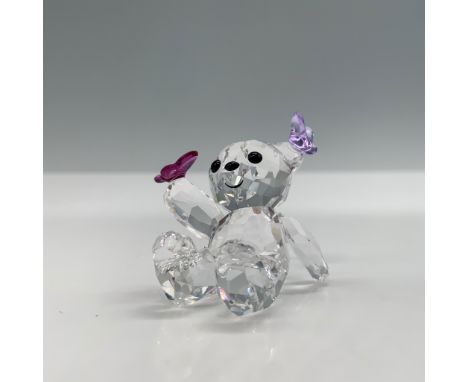 Introducing the delightful Swarovski Kris Bear Playful Butterflies figurine, a charming addition to any collection. This ador