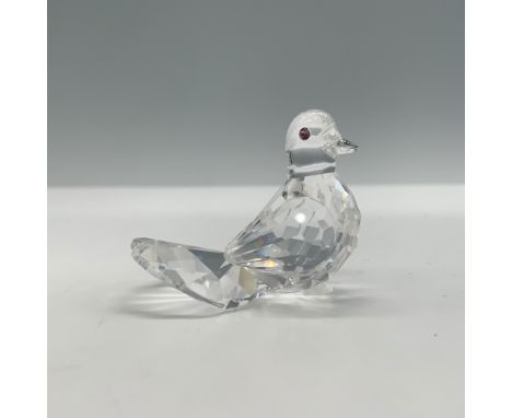 Swarovski crystal figurine of a dove with pink crystal eyes, model number 191696. Designed by Edith Mair, this piece was intr