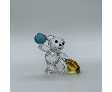 This charming Kris Bear figurine from Swarovski captures the spirit of adventure. Designed with 615 sparkling crystal facets,