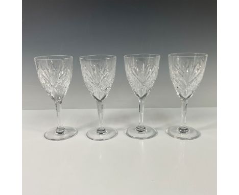 Elegant set of 4 St. Louis crystal wine glasses featuring intricate hand-cut designs. Crafted by the renowned French crystal 