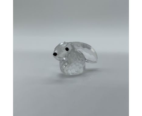This charming retired Swarovski crystal Bunny Rabbit is part of the In a Summer Meadow collection. Crafted from clear faceted