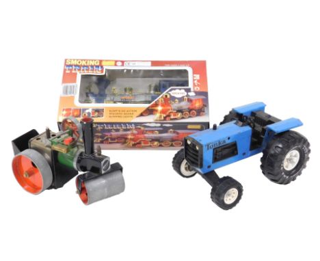 A Mamod steam tractor, Tonka tractor XMB-975, and a PMS Smoking Train, boxed. (3)