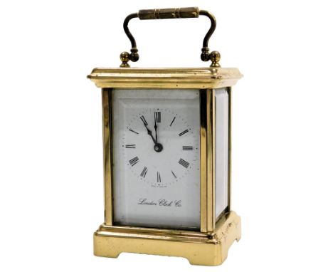 A London Clock Co. brass cased carriage clock, rectangular enamel dial bearing Roman numerals, single barrel movement, the ca