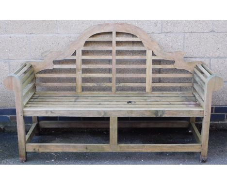 A Lutyens style three seater garden bench, 166cm wide.