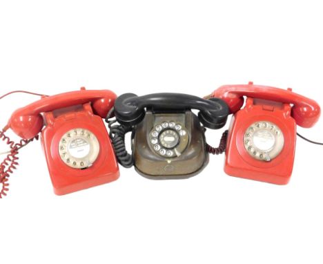 A vintage Belgian copper and brown Bakelite bell telephone, RTT-56A, and a pair of BT red dial telephones, one with on/off bu
