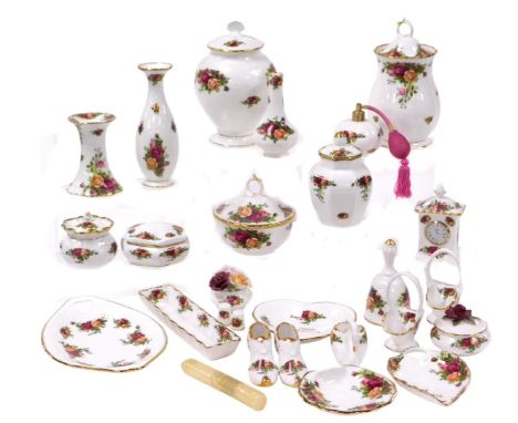 A group of Royal Albert porcelain Old Country Roses ornaments, including vases and covers, dressing table jars, atomiser, pai