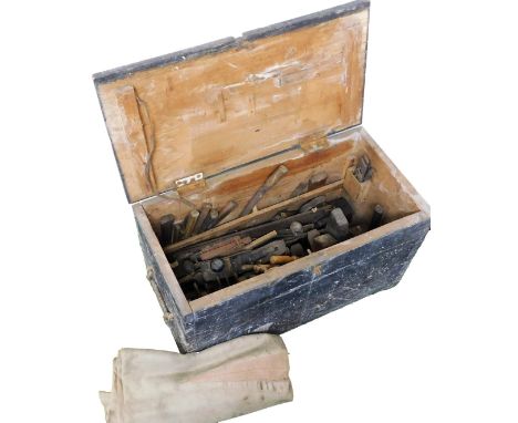 A stained pine carpenter's tool chest, containing assorted planes, chisels and other tools, 48cm x 81cm x 41cm.