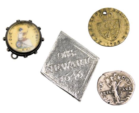 A Hadrianus silver denarius, replica Newark siege shilling, George III spade guinea token, and Queen Victoria gilt and enamel