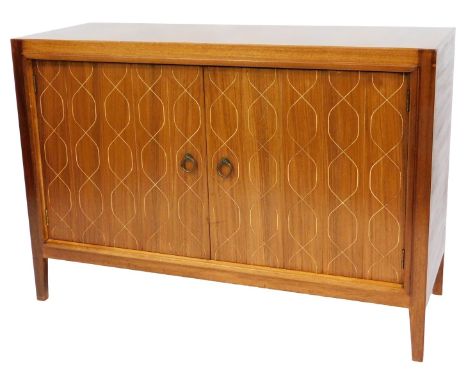 A 1950s Gordon Russell of Broadway mahogany and rosewood Helix sideboard, the two doors opening to reveal a shelf, short draw