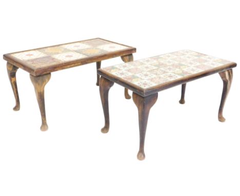 An oak and tile top rectangular coffee table, inset with eight Victorian floral tiles, raised on cabriole legs, 54cm x 67cm x