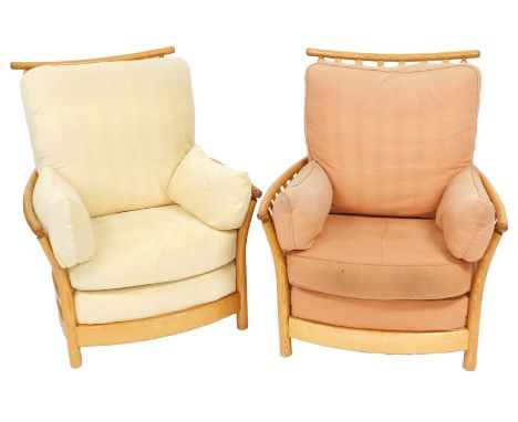 A pair of Ercol light elm and ash Renaissance armchairs, with peach and cream cushion seats and backs, 80cm wide.The upholste