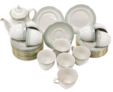 A Royal Doulton porcelain Berkshire pattern part tea service, comprising teapot, eleven teacups, saucers and plates.
