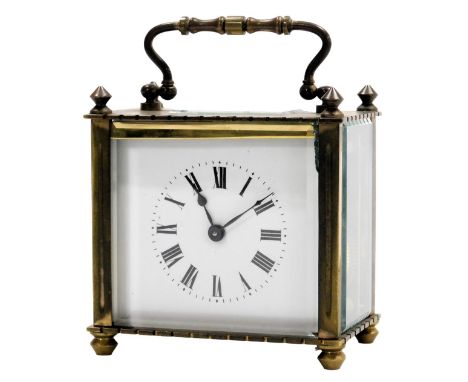 An early 20thC brass cased carriage clock, rectangular dial bearing Roman numerals, single barrel movement, the case of recta