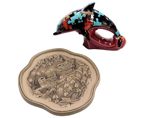 A Poole pottery Jigsaw pattern dolphin, painted marks, 22cm wide, together with a Winter plaque, number 4 of the series Four 