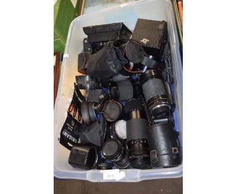 Quantity of assorted lenses and camera equipment