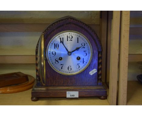 A wooden mantel clock