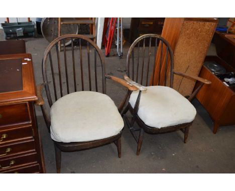 Pair of stick back armchairs with sprung and cushioned seats