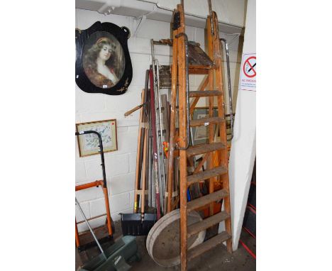 Two folding step ladders and a large quantity of assorted gardening tools